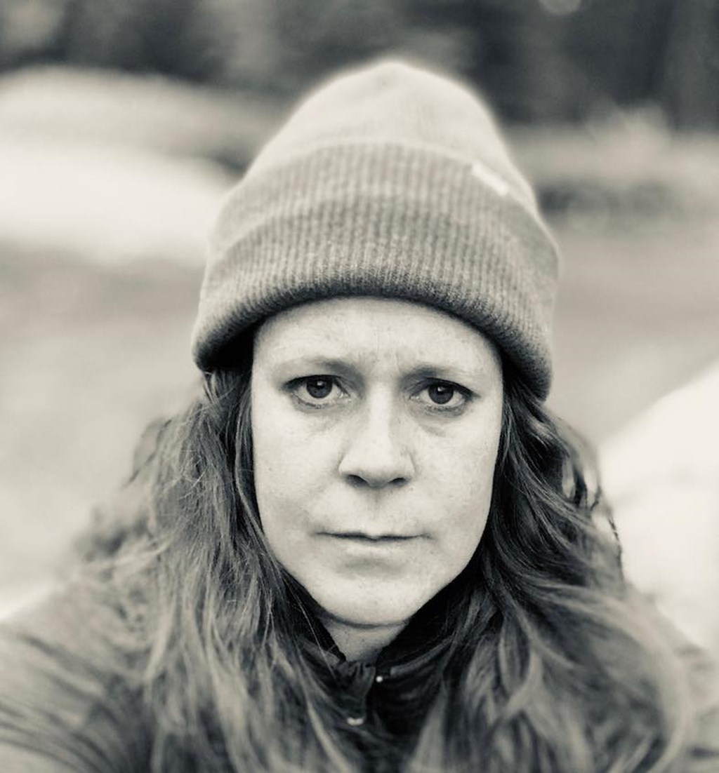 S. Katy Tucker - Projection Designer - pictured in stocking hat and coat