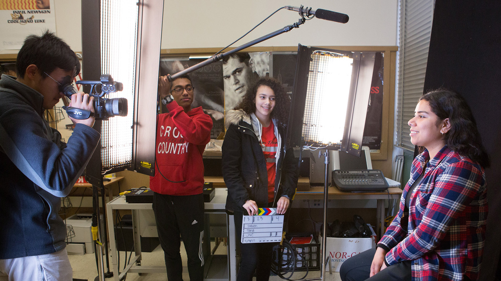 students working together in a film studio