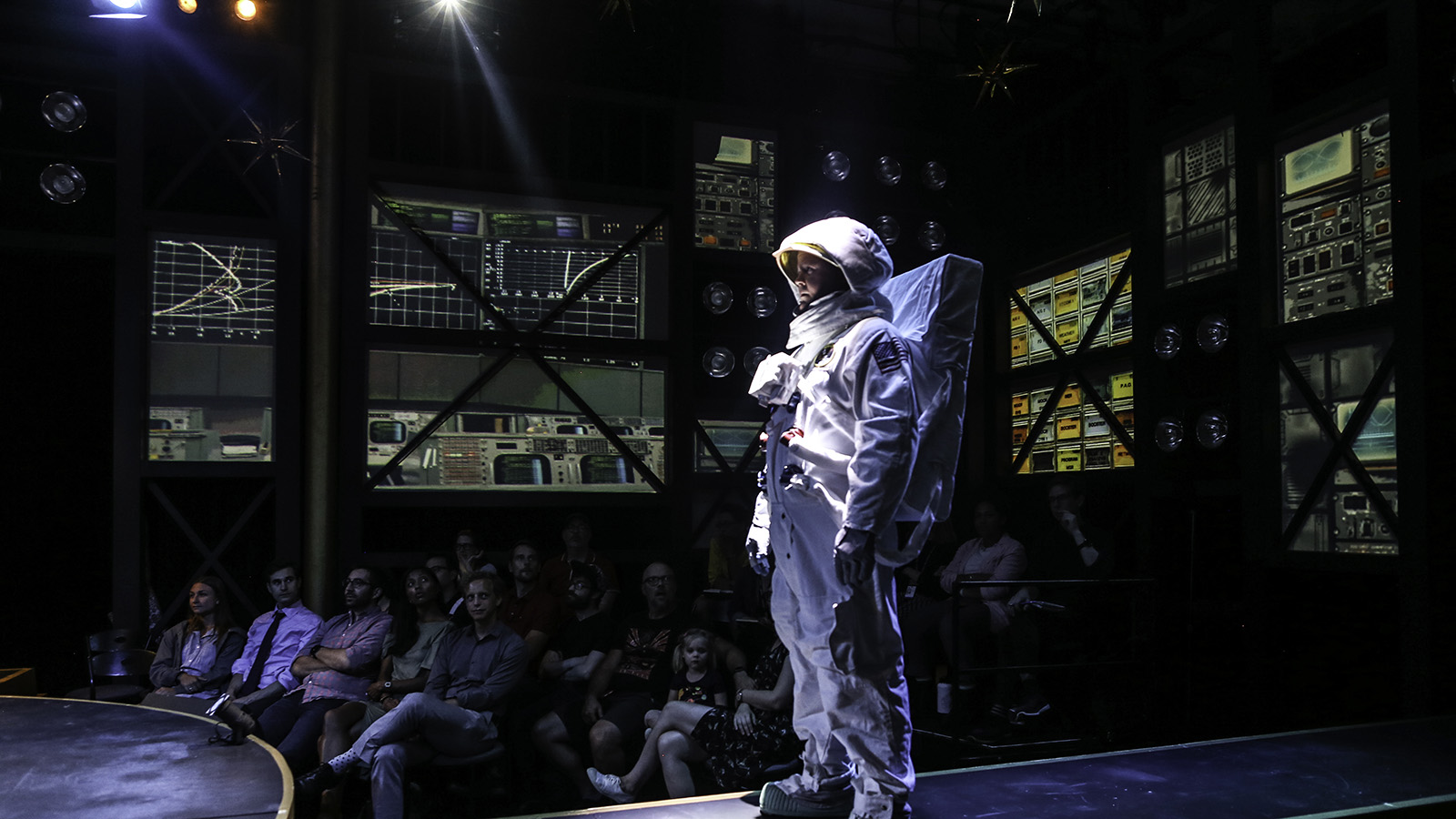 An actor is dressed as an astronaut in Earthrise