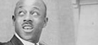 A black-and-white photo of jazz lyricist, composer, and pianist Eubie Blake.