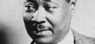 A black-and-white photo of the face of writer Claude McKay.