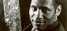 A black-and-white image of actor, singer, and activist Paul Robeson.