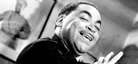 A black-and-white photo of jazz pianist, vocalist, and composer Fats Waller.