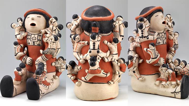 A traditional clay storyteller doll.