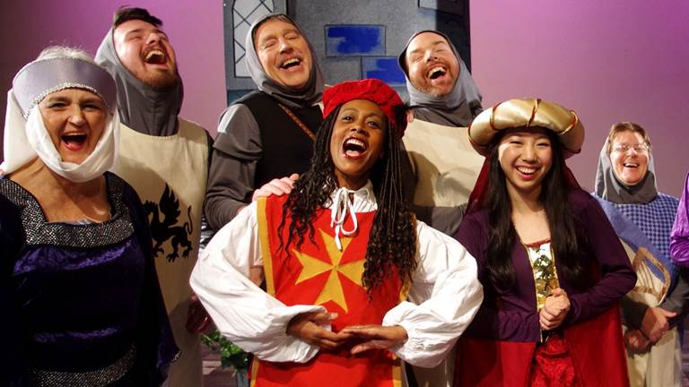 A group of students in medieval costumes. 