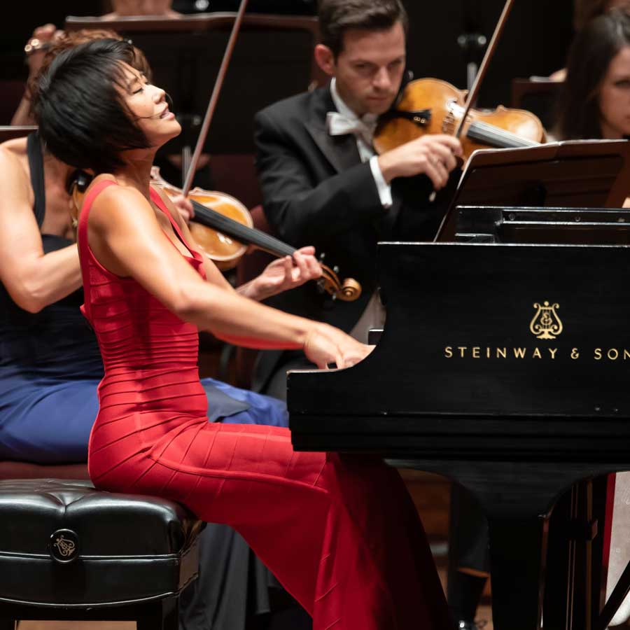 Yuja Wang playing the classical piano with the National Symphony Orchestra.