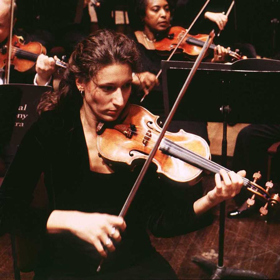 A musician playing the violin.