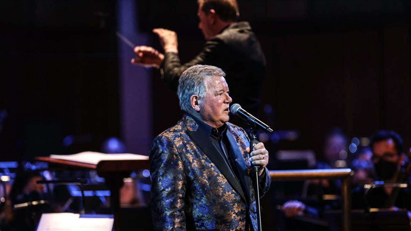 William Shatner singing with NSO while Steven Reineke  is conducting.
