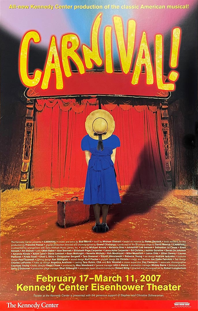 A young girl in a blue dress and straw hat stands facing a red curtained tent with a suitcase at her feet. Colored lights shine above.