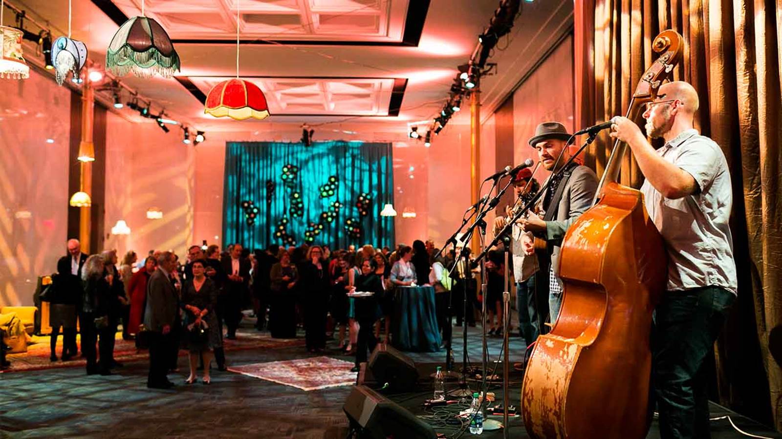 Circles Members enjoying live music at a cast party.