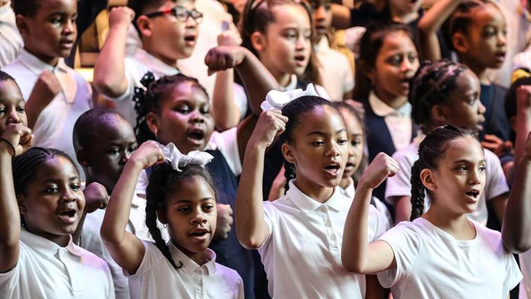 A photo of students performing.