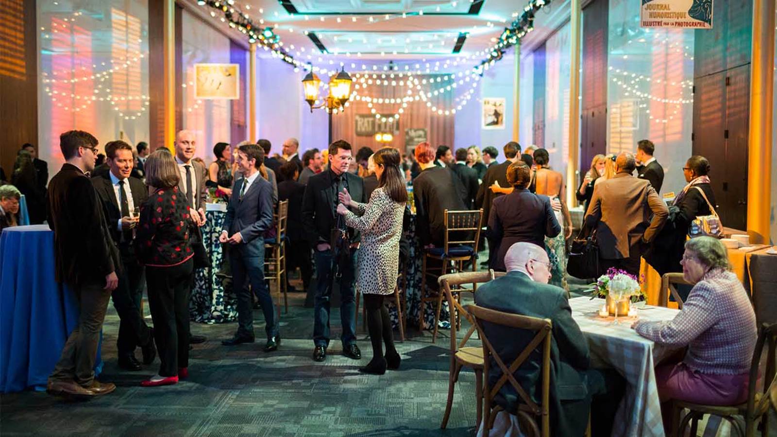 Circles Members mingling and dining at a cast party. 