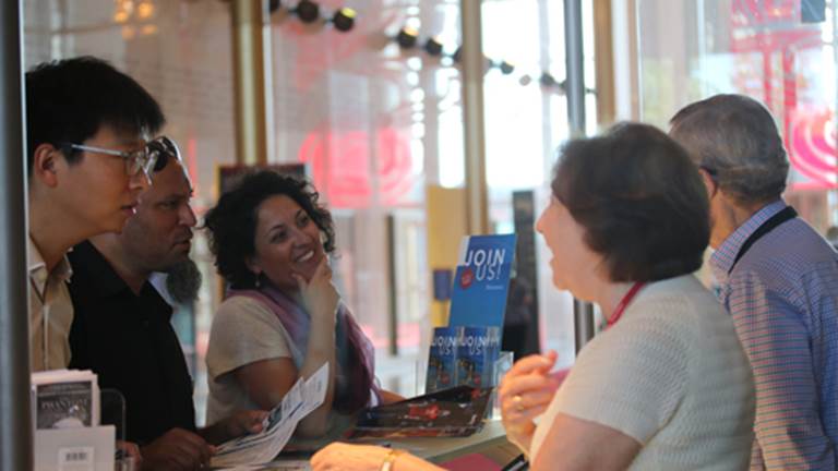 Volunteers greeting guests at the Visitors Center. 