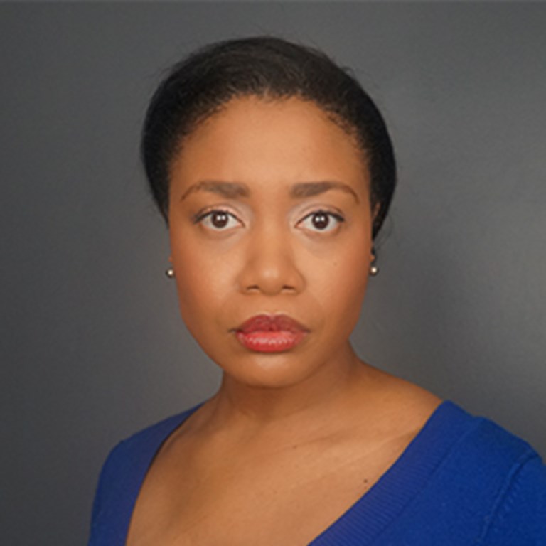 Lauren Davis is staiting straight at you with her air pulled back